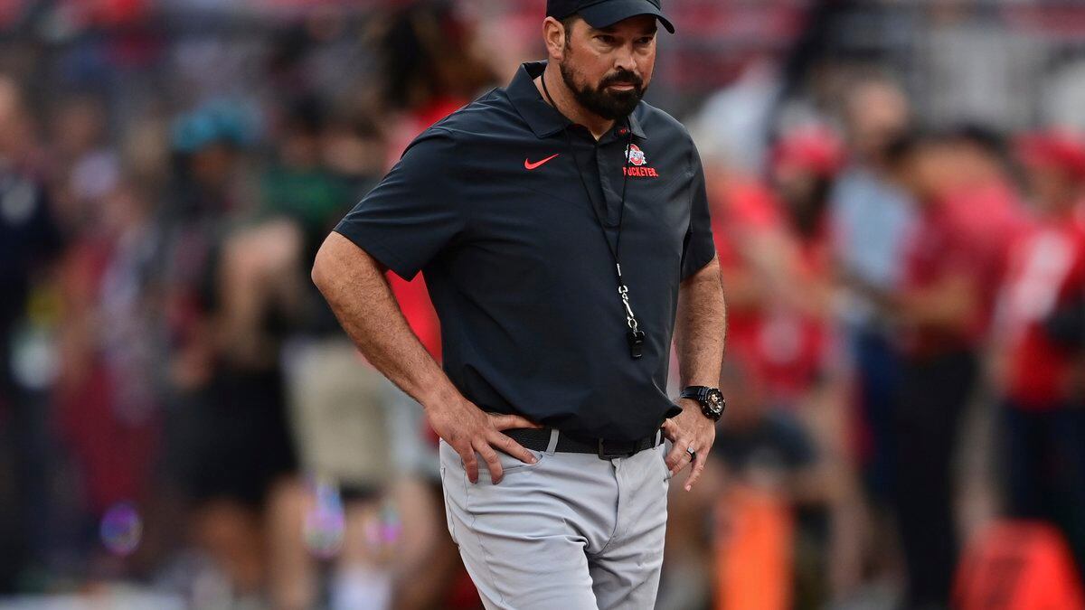 FILE - Ohio State head coach Ryan Day walks before an NCAA college football game against Notre...