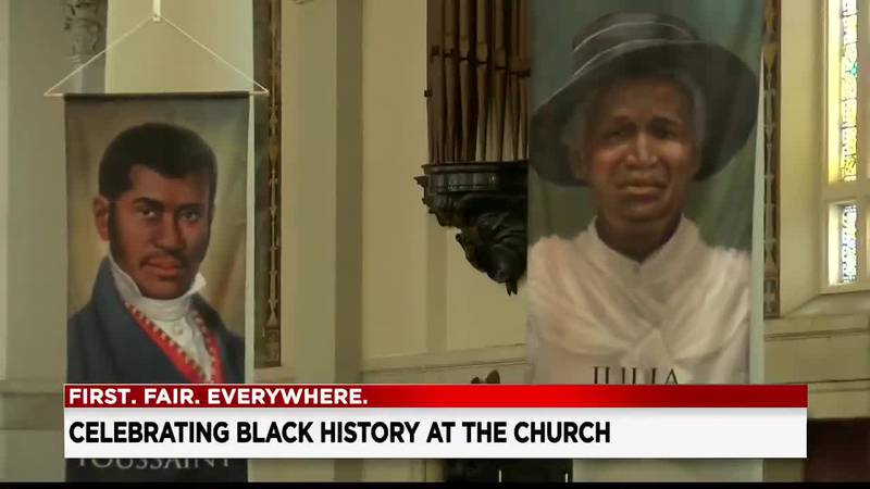 St. Aloysius-St. Agatha Church displays banners of Black Catholics who are on the road to...